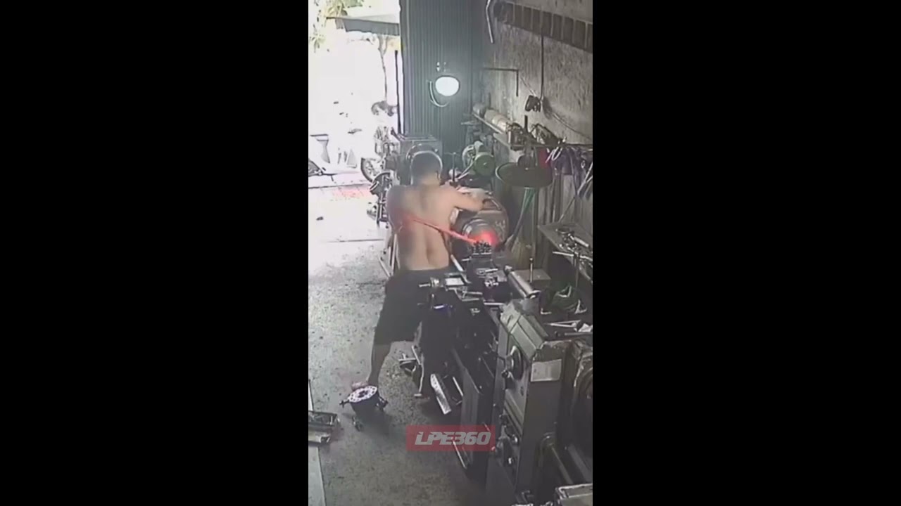 Man has shirt shredded off in lathe machine