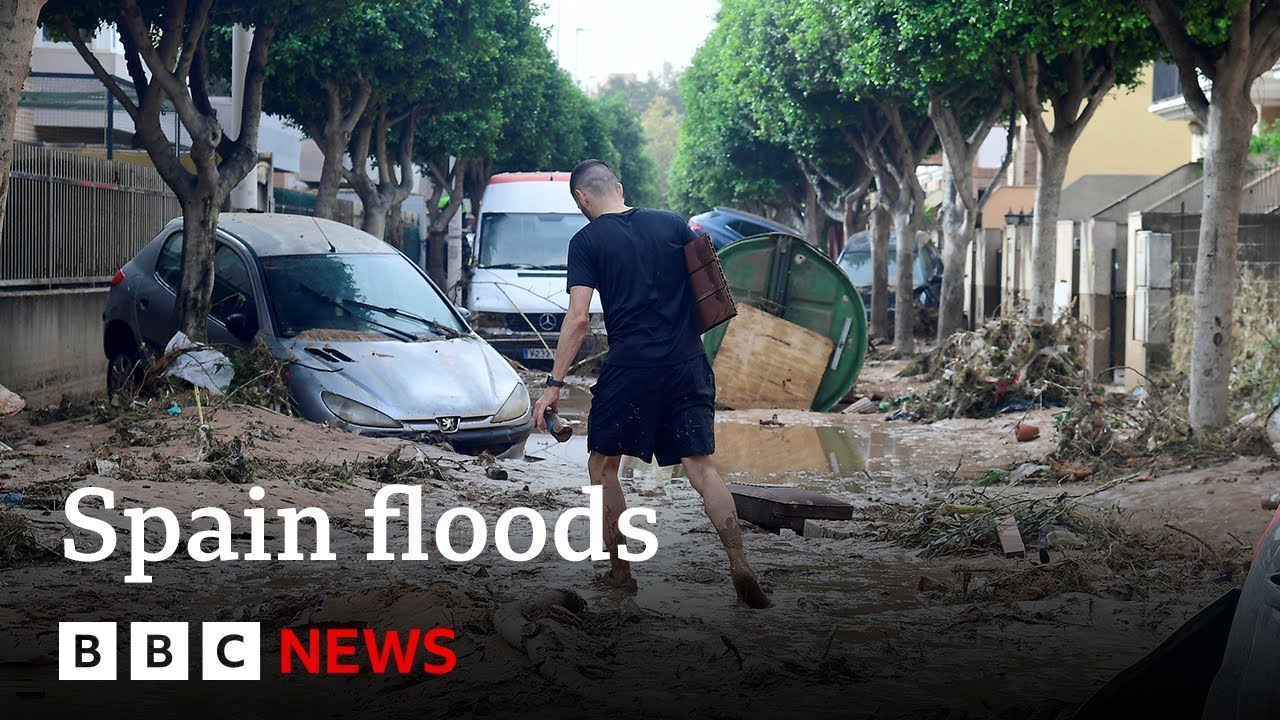 Spain's King Felipe 'devastated' by deadly floods as PM warns of dangerous conditions | BBC News