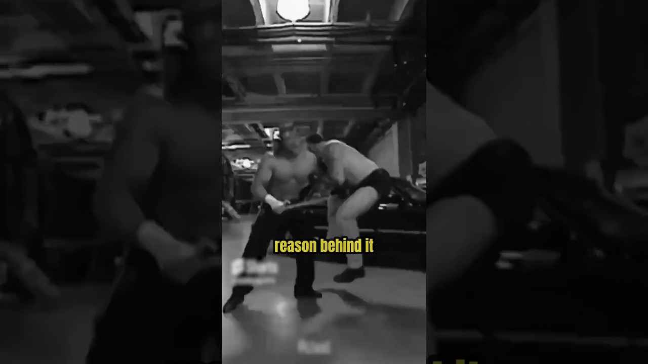 Why does Triple H always cover the sledgehammer’s head with his hand?