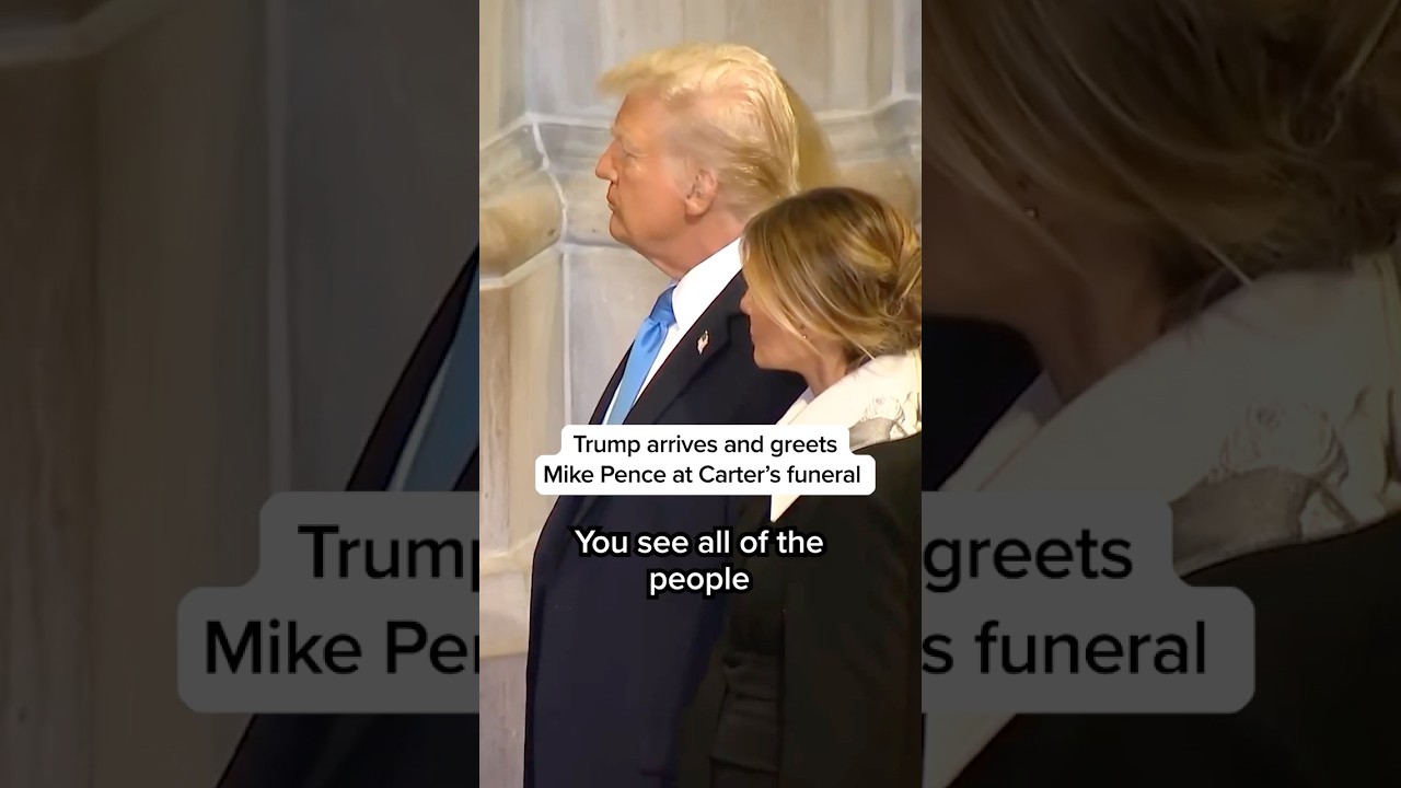Trump arrives and greets Mike Pence at Carter's funeral
