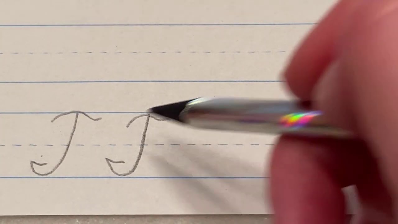 Capital "T" in cursive