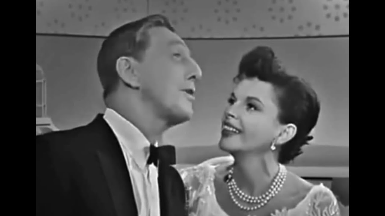 Ray Bolger sings "If I Only Had A Brain" to Judy Garland